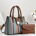 Casual 2-piece bag set featuring a colorful woven stripe tote and brown leather wallet. - 28*13*21cm / Red