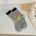 Cute grey mid-calf socks featuring a cartoon bear illustration and black ribbed cuffs - Gray Bear Theme / Gray