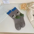 Cute grey mid-calf socks featuring a cartoon dog illustration and blue ribbed cuffs. - Dark Gray Dog Style / Dark Gray