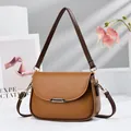 Elegant mini tan faux leather underarm bag featuring a stylish curved flap and gold metal clasp - 22*10*16 / Earthy Yellow