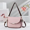Elegant pink saddle shoulder bag with brown trim and minimalist chic design for women - 22*10*16 / Pink