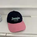 Stylish two-tone baseball cap in black and pink featuring mint green Jasmine embroidery - 56-58cm Adjustable / Black