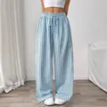 Pantalones anchos con rayas verticales azules y blancas y cordón ajustable en cintura. - S / Bottoms / Rayas Azules