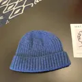 Close-up detail of the ribbed texture on a warm blue winter knit beanie for men - Approx. 56-58cm (Elastic) / Round Cuffed Landlord Hat / Blue
