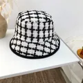 Close-up of black and white plaid knit bucket hat with soft texture for winter - 55-58cm / White
