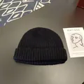 Detailed view of a black knitted beanie featuring a classic ribbed texture and folded cuff. - Approx. 56-58cm (Elastic) / Round Cuffed Landlord Hat / Black