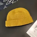 Detailed view of a mustard yellow ribbed knit beanie, warm winter miki hat for men. - Approx. 56-58cm (Elastic) / Round Cuffed Landlord Hat / Yellow