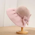 Elegant pink Audrey Hepburn style straw hat with a large organza bow detail - 56-58cm / Pink