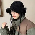 Stylish black winter knitted beanie with plush ear flaps and brim for warmth. - 56-60cm / Black