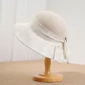 Chapeau de soleil élégant en paille pour femme avec large bord et grand nœud décoratif - 56-58cm / Beige