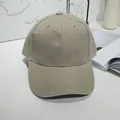 Close-up of a minimalist khaki cotton baseball cap with high-quality twill texture - 55-60cm / Khaki with Contrast Trim