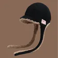 Warm black aviator hat with soft brown faux fur lining and earflaps. - 56-58cm / Black