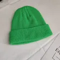 Bright green ribbed knit beanie hat for street style, autumn wear, and casual look - One Size / Fruit Green