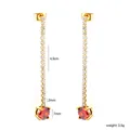 Vista detallada de pendientes de borla de cristal rojo con dimensiones y peso de 3,5g - Pendientes / Dorado