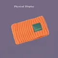 Warm orange knitted headband for winter with a stylish green pipisweet letter patch - One Size / Orange