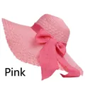 Elegant pink straw sun hat with large wave brim and oversized bow for summer beach - Pink