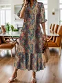 Vue complète de l'élégante robe maxi bohème à col en V avec motifs cachemire colorés - S / Haut Et Bas / Curcuma