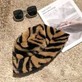 Stylish tiger stripe plush bucket hat shown with fashion accessories in a detailed view - 55-58cm / Camel
