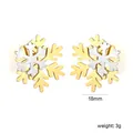 Detailed view of two-tone stainless steel snowflake stud earrings with size markers - 18mm