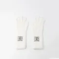 Guanti invernali in peluche bianco morbido per donna con simpatica toppa con pinguino - Elastico / Bianco