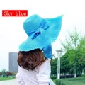 Elegant sky blue wide brim straw beach sun hat for women with a large ribbon bow - Sky Blue