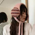 Cute pink plush earmuffs with striped pattern and long ties for women winter warmth - One Size / Pink