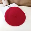Close-up detail of a vibrant red wool beret hat showing soft texture - 55-58cm (Stretchy) / Beret / Rose Red