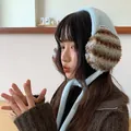 Stylish Korean-style plush earmuffs in light blue featuring cozy striped textured ear covers - One Size / Blue