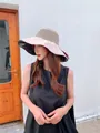 Detailed view of women's wide-brim sun hat with hollow breathable top and black glue lining - 55-58cm / With Windproof Rope / Khaki