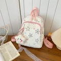 Close-up of white Korean style backpack with star pattern and plush star charm - White Pink Star (With Pendant)