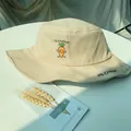 Detailed view of a beige bucket hat featuring cute carrot embroidery and MS. CARROT text. - 56-58cm / Khaki (Carrot Embroidery)
