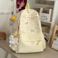 Japanese style pastel yellow backpack with cute cartoon pony prints and plush charm - Yellow with Pendant