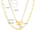 Detailed view of gold-plated stainless steel double-layer necklace with handcuff pendant - Double Layer Handcuff Necklace (NE248701G) / Gold