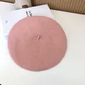 Detailed view of a minimalist pink wool felt beret with soft texture for winter fashion - 55-58cm (Stretchy) / Beret / Water Pink