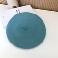 Top view of a blue wool beret featuring a soft felt texture for autumn winter - 55-58cm (Stretchy) / Beret / Sky Blue