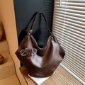 Stylish large capacity dark brown slouchy hobo tote bag with a soft leather texture - Brown