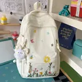Japanese style cream floral embroidered backpack for school students with plush charm - With Charm / White