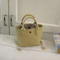 Elegante Mini-Beuteltasche im koreanischen Stil aus gelbem Leder mit Kordelzug-Innentasche - Mini / Gelb