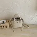 Klassische Vintage Mini-Eimertasche in Cremeweiß mit gestreiftem Kordelzug-Innenfutter - Mini / Weiß