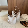 Elegant cream woven bucket bag for summer, large capacity shoulder and crossbody design - L / Off White