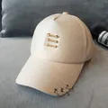 Casquette de baseball mercerisée champagne avec anneaux en fer et accents métalliques dorés - Rose Clair