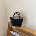 Mini sac à main noir minimaliste avec pochette intérieure à rayures et cordon - Mini / Noir