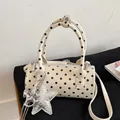 Cream and black polka dot barrel handbag featuring a silver star charm and shoulder strap. - With Pendant / Off White