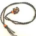 Handmade woven black mesh pouch necklace featuring a raw tiger eye stone pendant - Tiger's Eye / Black