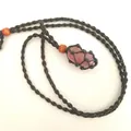 Handcrafted black braided net necklace featuring a polished natural pink crystal pendant - Red Strawberry / Black