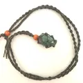 Handmade adjustable black woven mesh necklace featuring a green raw crystal stone pendant - Ruby Zoisite / Black