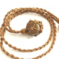 Handmade brown woven net pocket necklace featuring a natural green and red stone pendant - Unakite / Brown