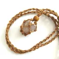 Hand-woven brown net necklace with a natural polished crystal stone pendant - Cherry Blossom Agate / Brown