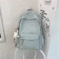 Light mint green floral student backpack for summer with a cute white star pendant accessory - With Charm / Gray