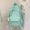 Fresh mint green student backpack with cute floral pattern and star ribbon accessory - With Charm / Green